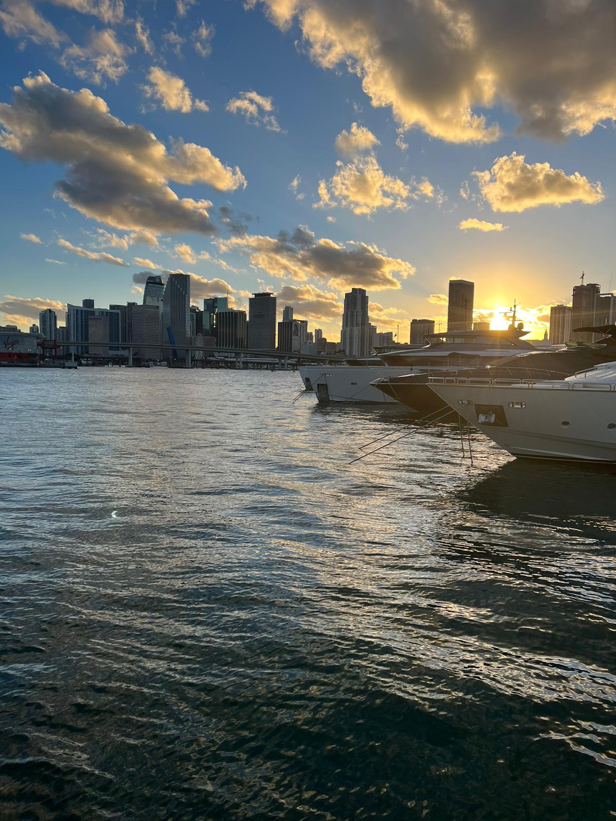 Yacht with skyline in miami